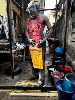 Yíímiiká at work in the dye studio